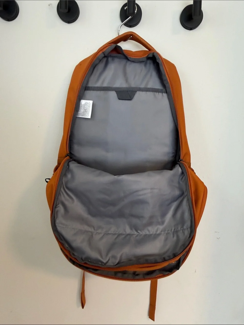North Face Jester Backpack in burnt orange & black accents Excellent Condition